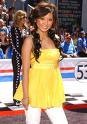 Brenda Song in a hot yellow top